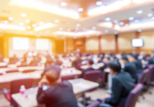 Blur of business Conference and Presentation in the conference h Blur of business Conference and Presentation in the conference hall.