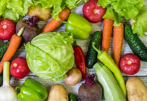 Different colorful vegetables all over the table in full frame. Healthy eating Different colorful vegetables all over the table in full frame. Healthy eating.