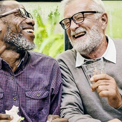Men laughing at restaurant_resized image